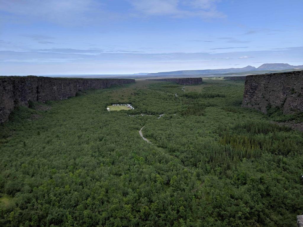 The view over Ásbyrgi. The field is where Sigur-rós played.