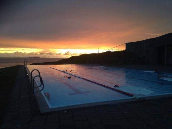 Pool in Iceland in sunset.