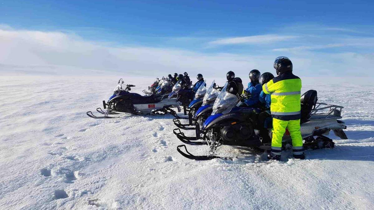 Captain Slow Crosses Langjökull Glacier on a Snowmobile