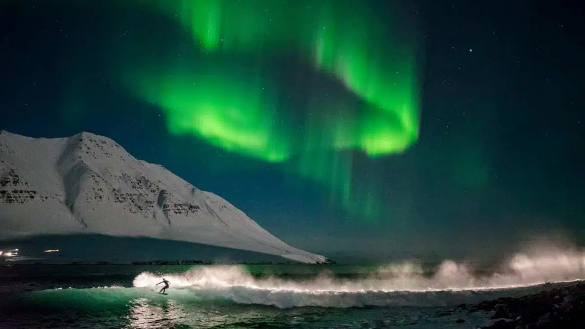 Surfing Iceland Beneath the Northern Lights – Brace for the Storm and Surf!