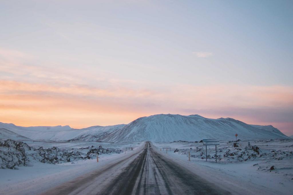 Icelandic road in winter. Watch out for slippery roads to stay safe in winter.