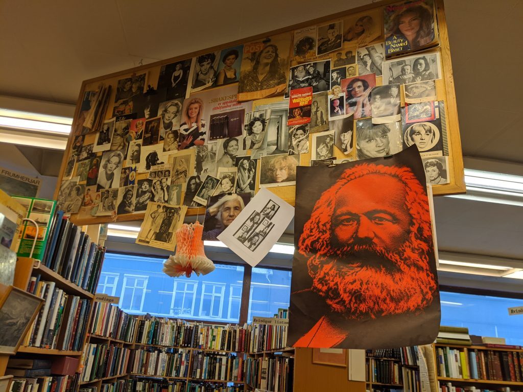 photo of Karl Marx and girls at Bókin antique book shop in Reykjavik