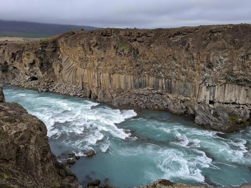 Basalt columns in Skjálfandafljót river in Iceland.