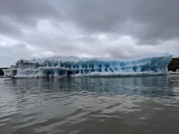 Big iceberg on Fjallsárlón glacial lagoon.