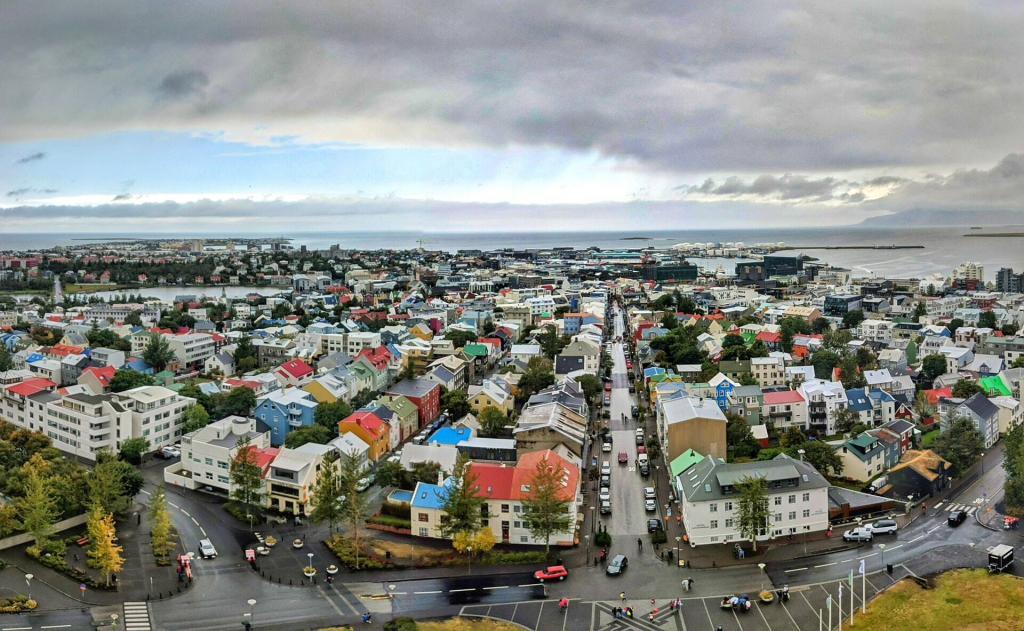 This a guide to how to pay for things in Iceland. The picture shows a view of Reykjavik from the top of Hallgrímskirkja cathedral.