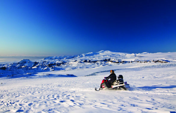 Man on a snowmobile in Iceland