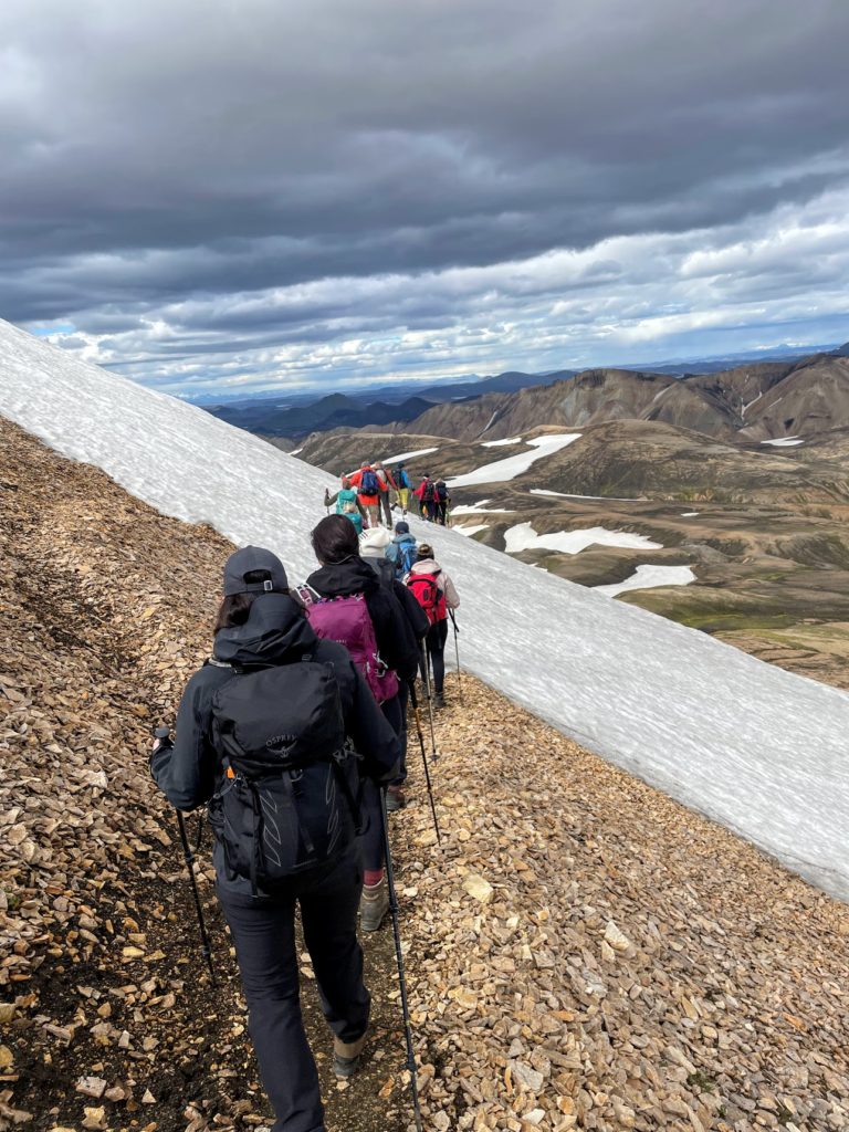 Hikers on a mountainside in Iceland. 