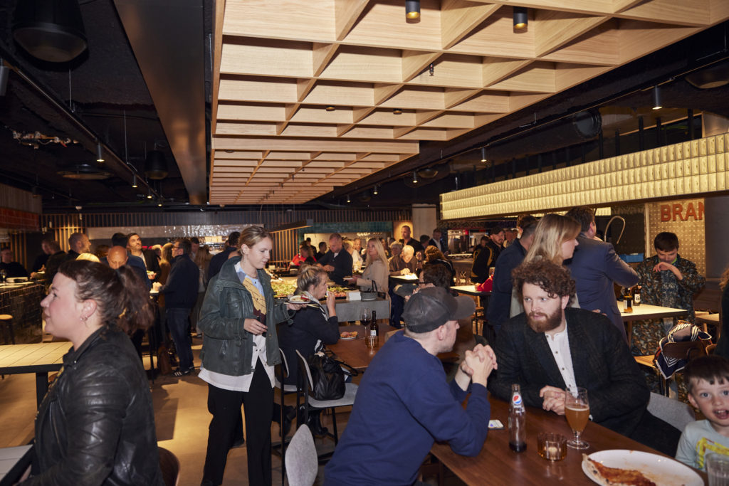 People eating and drinking at Gallery Hafnartorg in Reykjavik