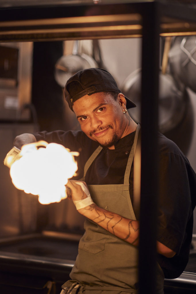 Man cooking at Gallery Hafnartorg in Reykjavik