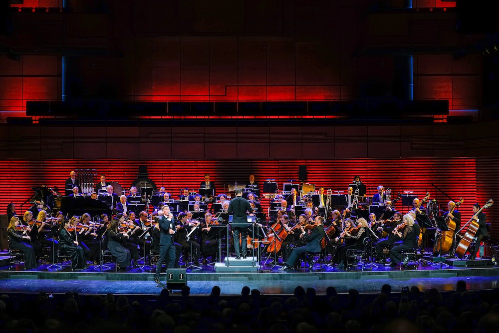 The Icelandic Symphony Orchestra on the stage in the magnificent Eldborg auditorium in the Harpa Conference and Concert Hall in Reykjavik.