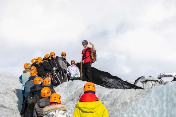 A guide on the Sólheimajökull glacier educates travelers on the Sólheimajökull glacier hiking tour which is operated by Arctic Adventures.