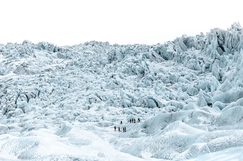 Glacial hiking on a small group tour with Hidden Iceland. Photo by Amy Robinson