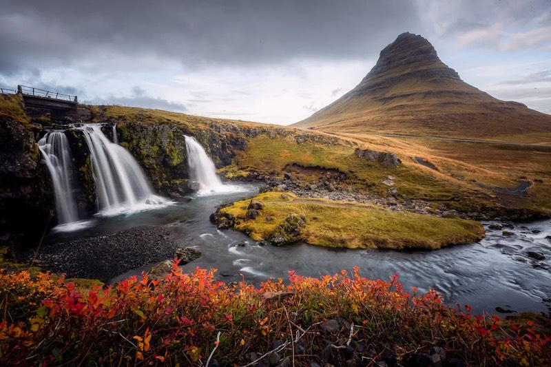 The iconic Kirkjufell with Kirkjufellsfoss in the foreground. Photo by Dennis Stever