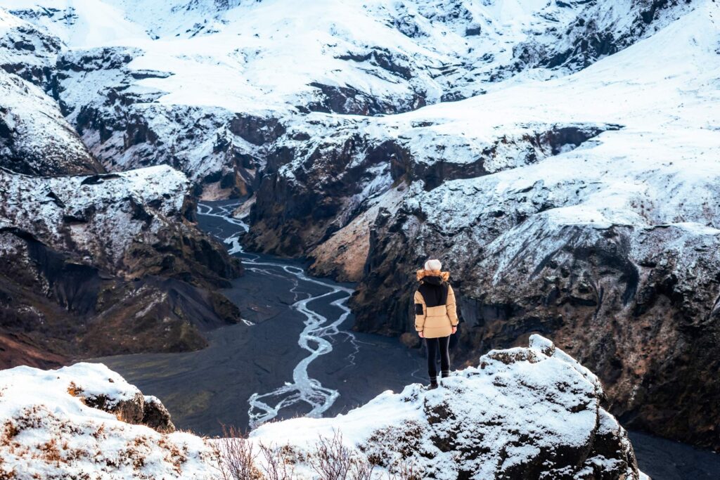 A woman at Valahnjúkur close to Thorsmork in the Icelandic highlands.