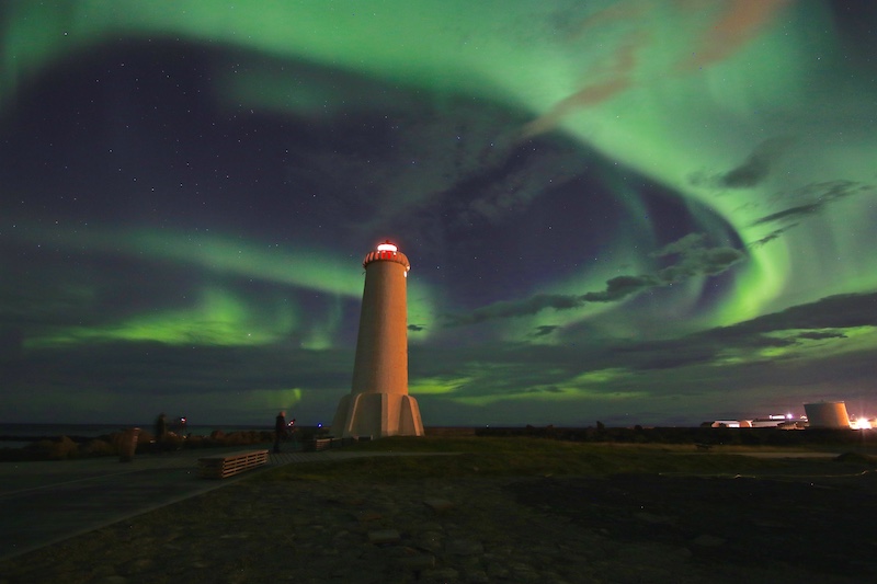 Akranes lighthouse in Iceland with the northern lights in the sky