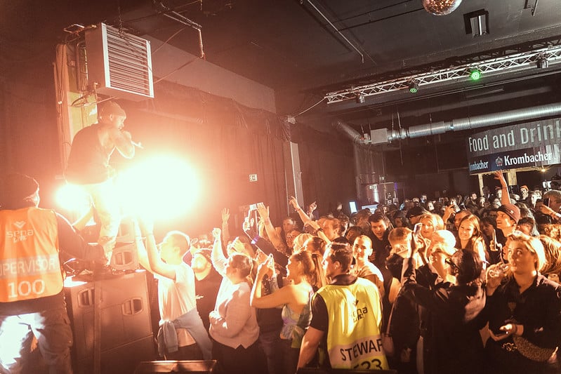 Icelandic rapper, Emmsjé Gauti performs in front of a crowd of fans