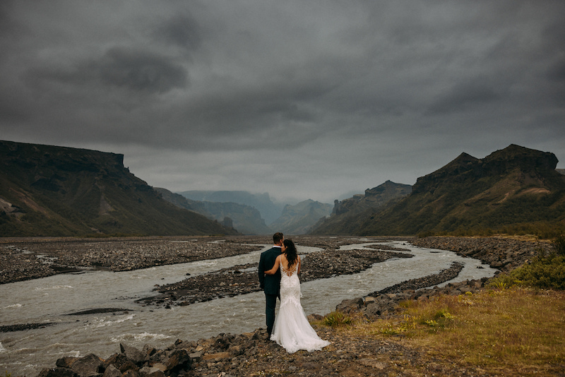 A bride and groom getting married in Iceland.