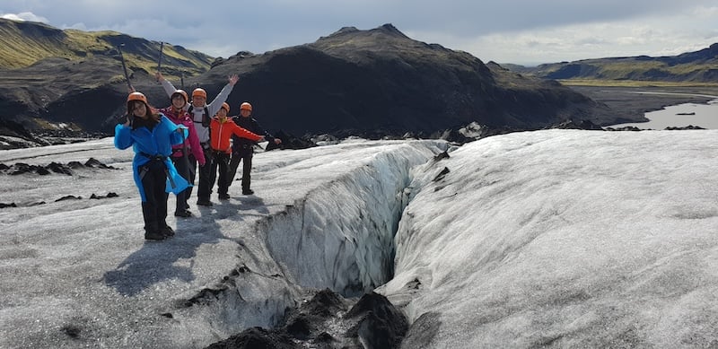 Shiny happy people traveling with Nice Travel on an Icelandic glacier