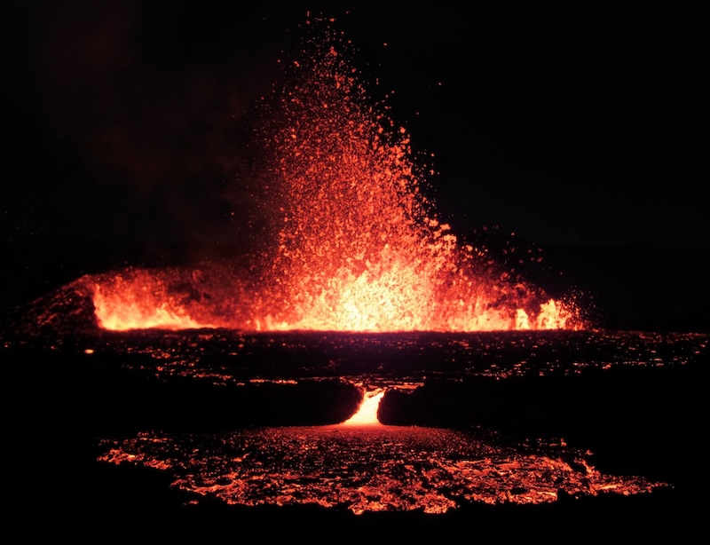 A volcanic eruption in Iceland is seen at night.