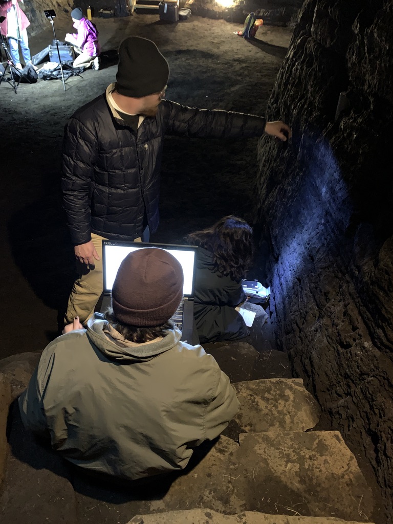 Scientists researching the caves of Hella.