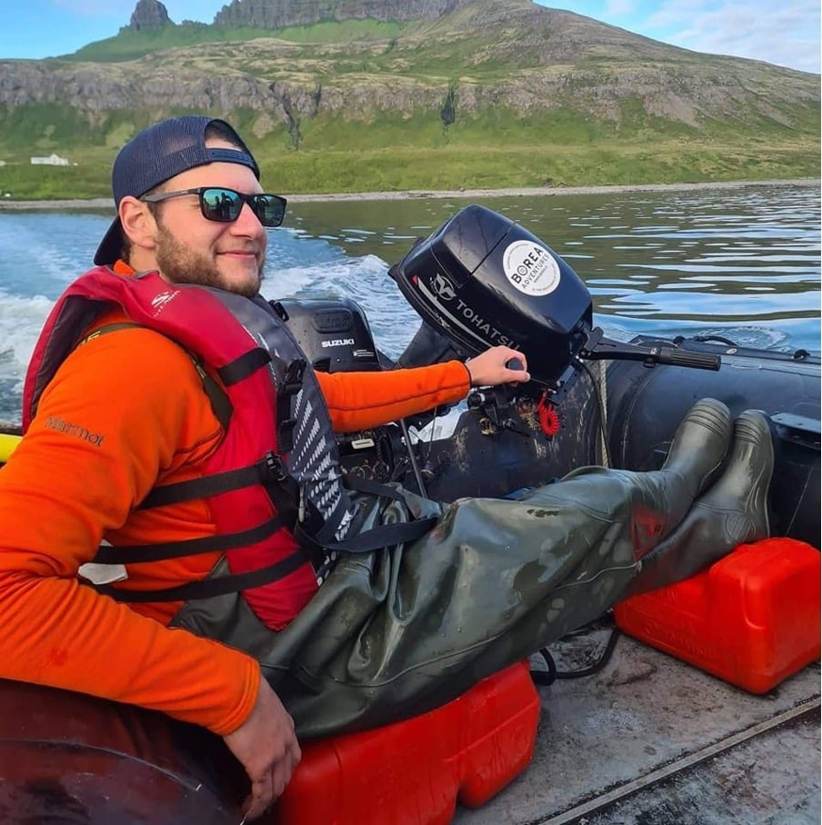 Justin Brown transporting a photography tour across Hornvik Bay