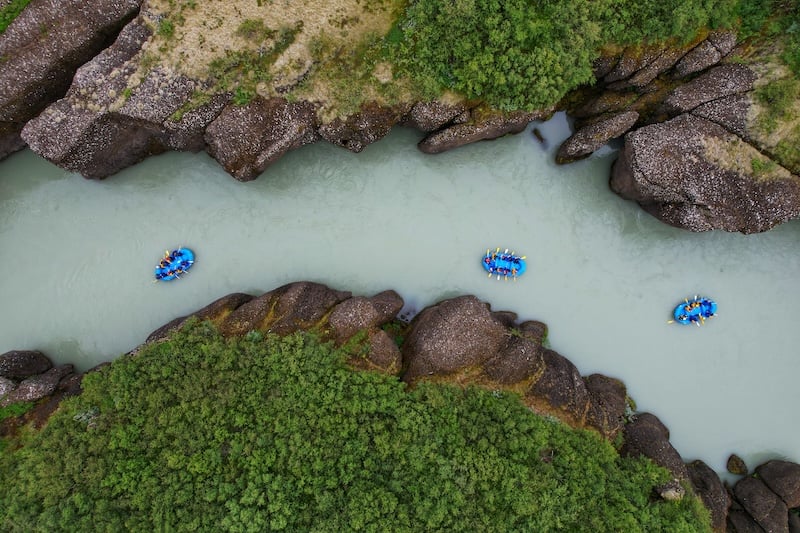 River rafting in the Hvítá river in Iceland from above.
