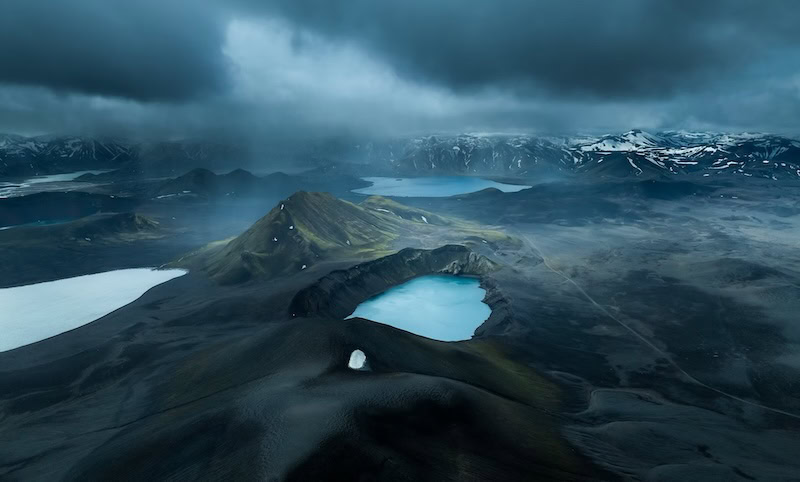 Mystical moods in the Icelandic Highlands—Kévin Pagès captures the raw beauty of a remote volcanic crater under stormy skies.