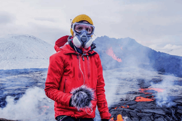 Kaśka Paluch recording natural sounds during the Fagradalsfjall volcanic eruption in Iceland. Wearing protective gear, she captures raw Icelandic soundscapes for her Noise From Iceland project.