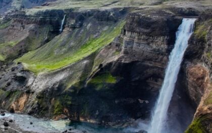Háifoss waterfall dropping into its green-walled canyon in Þjórsárdalur, Iceland, with the neighbouring fall Granni on the left