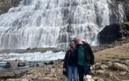 Leslie, Greg, and Olive the dog at Dynjandi. When this is your neighborhood waterfall, you've chosen your farm well.